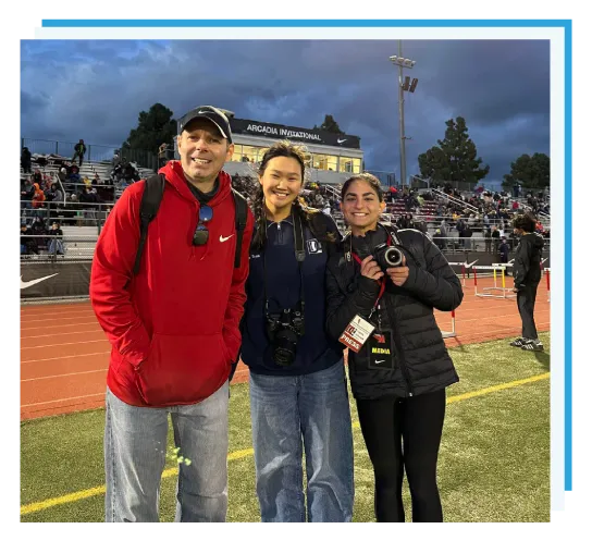 A student photographer at a football game