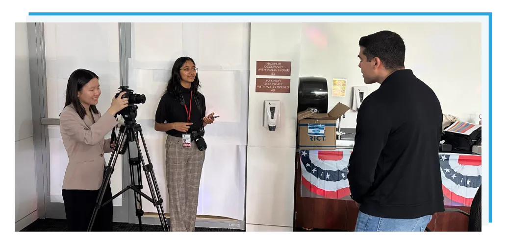 3 students working together to film a video