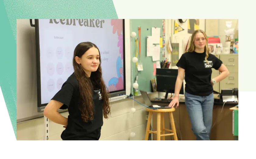 Two students preparing to speak.