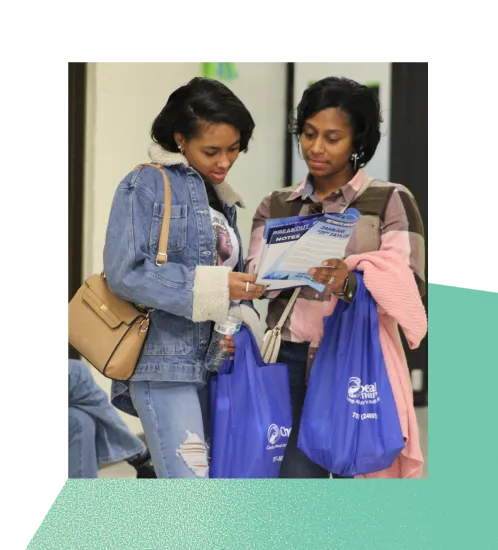 A Parent and Student learning about the school