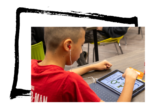 A student learning the Cherokee language using an Ipad 